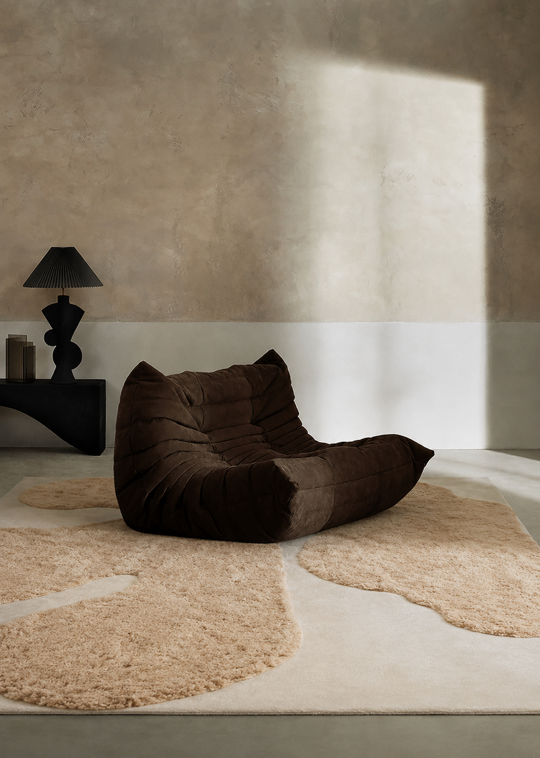 Hewn Earth Studio Bloom rug in sand and cream with a handwoven textured pattern, showcasing its detailed craftsmanship.