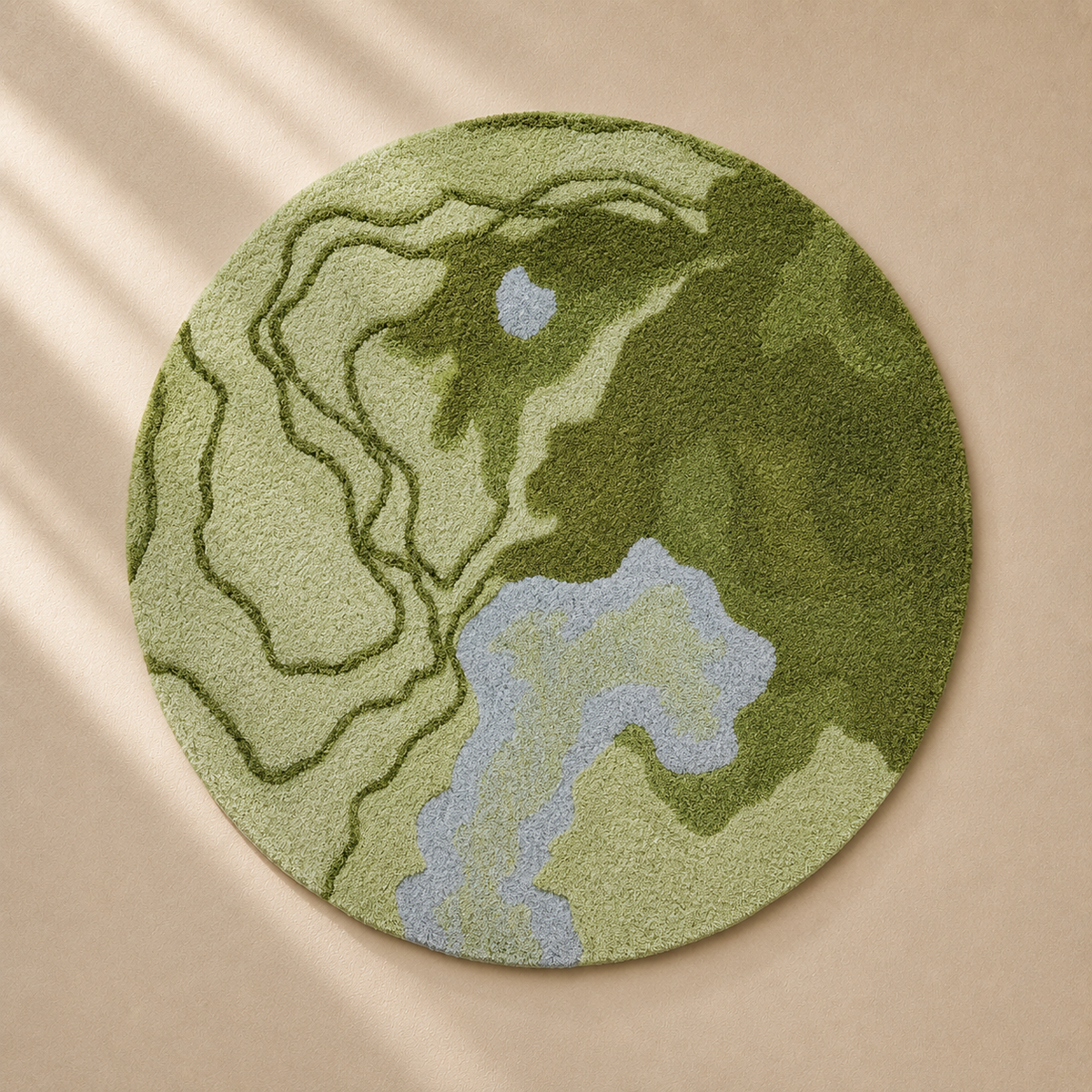 Hewn Earth Studio Fen rug with moss-colored woven textile and textured design, showcasing natural-inspired floor decor.