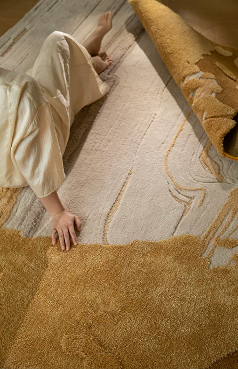 Hewn Earth Studio Lode rug with gilt ridges, showcasing textured, woven pattern in warm earthy tones.