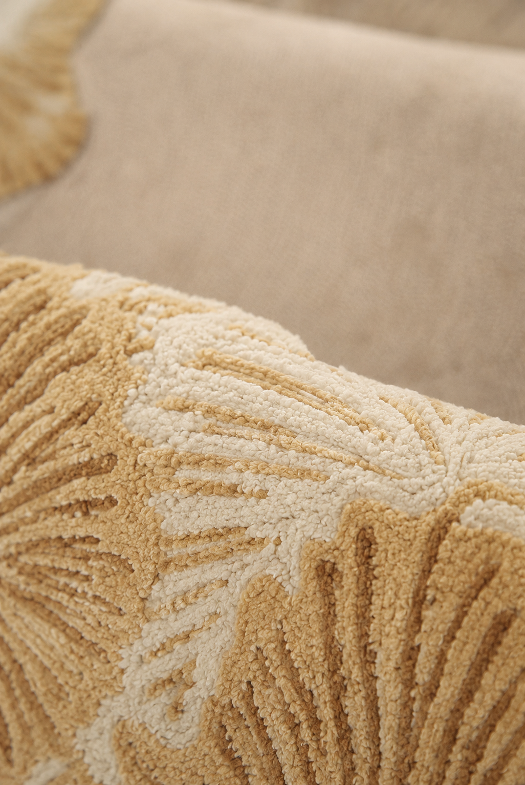 Hewn Earth Studio Lotus rug in golden wheat with intricate woven pattern, shown from the back side.