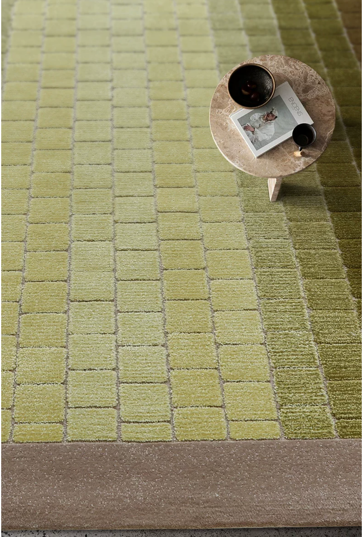 Hewn Earth Studio Mosaic rug featuring a moss gradient design with intricate patterns, perfect for adding texture to a living space.