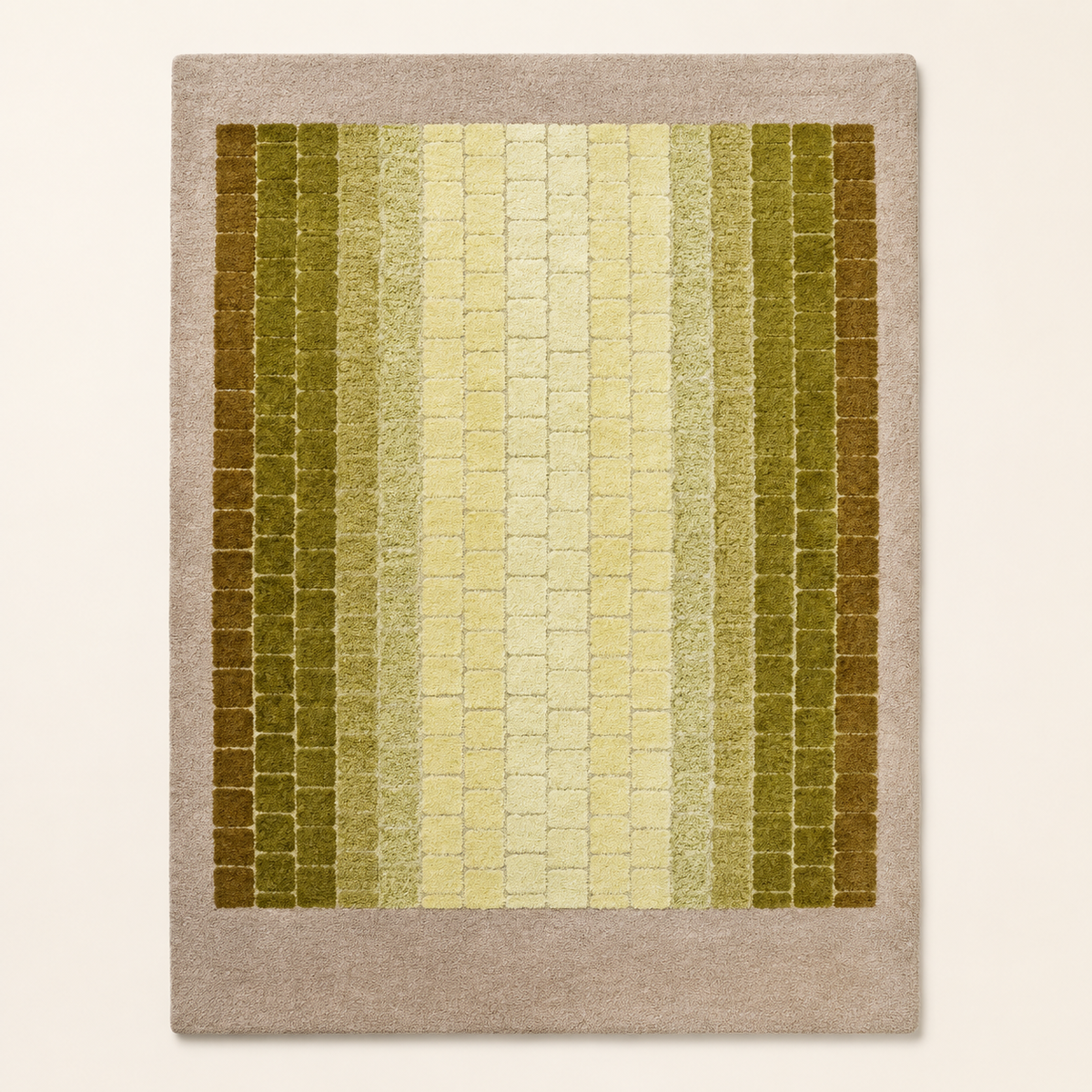 Hewn Earth Studio mosaic rug with a moss green gradient design, showcasing intricate patterns and textured surface.