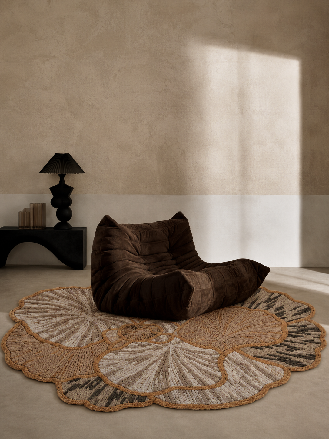 Hewn Earth Studio Petal rug featuring ash and rust colors with a soft, textured edge design.
