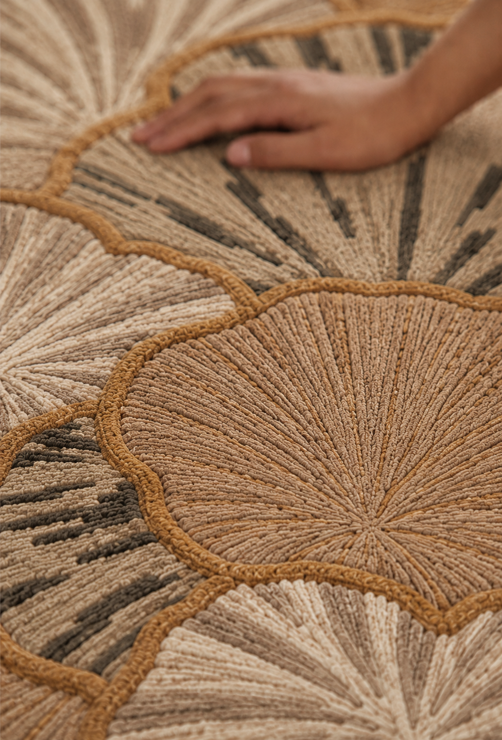 Hewn Earth Studio Petal rug featuring a soft ash and rust floral design, woven with textured fabric for cozy home decor.