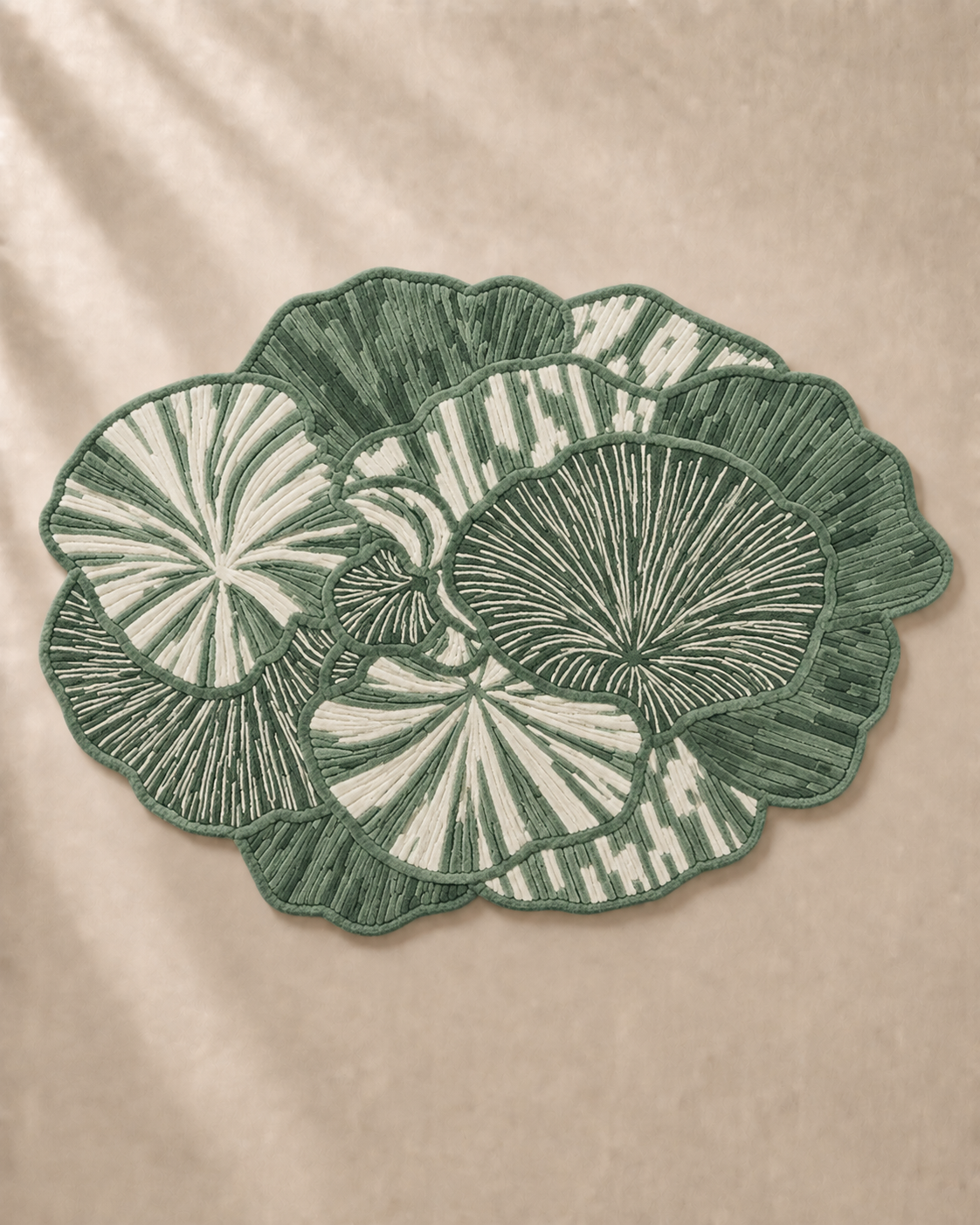 Hewn Earth Studio Petal rug in sage and cream with floral petal pattern, soft and textured area rug for living rooms.