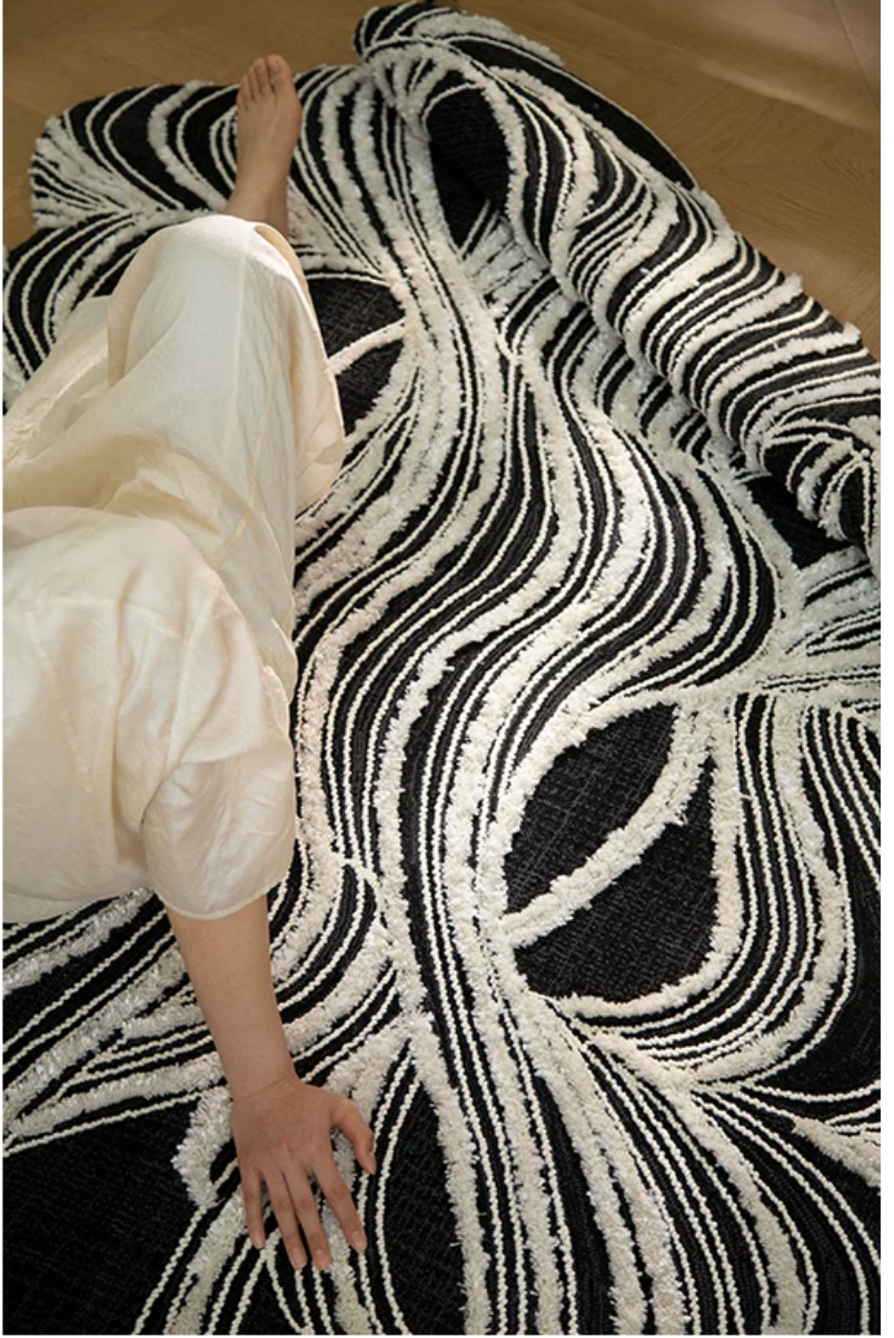 Hewn Earth Studio Plume rug featuring intricate ink and bone patterns, showcasing detailed textile craftsmanship.