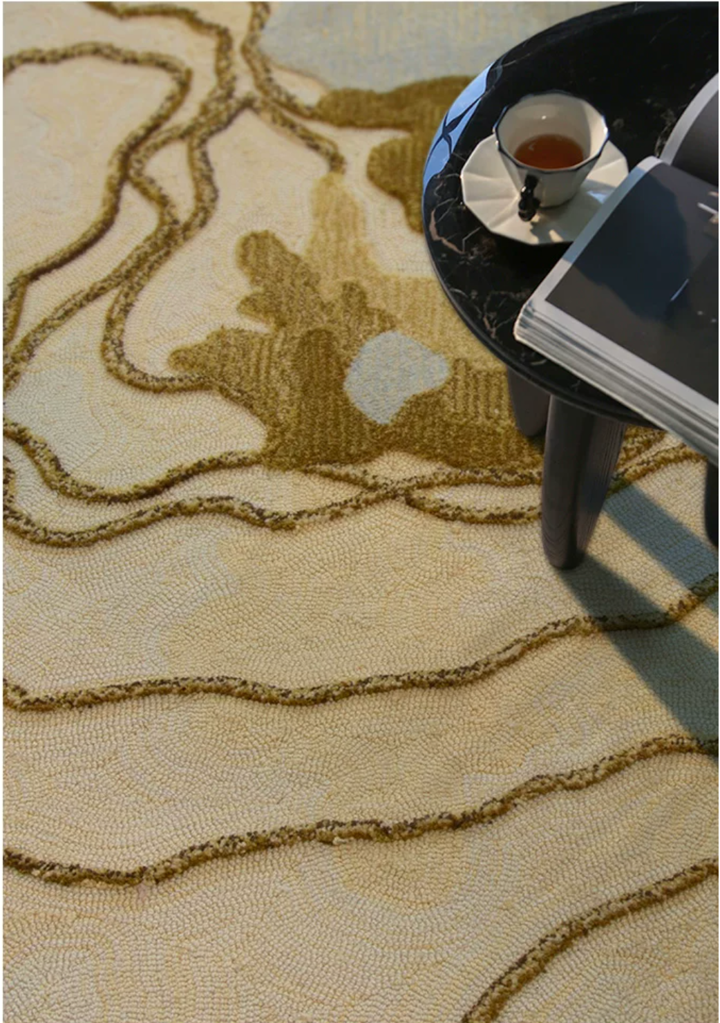 Hewn Earth Studio Strata rug in ochre, showcasing a textured, layered design with earthy tones and intricate pattern details.
