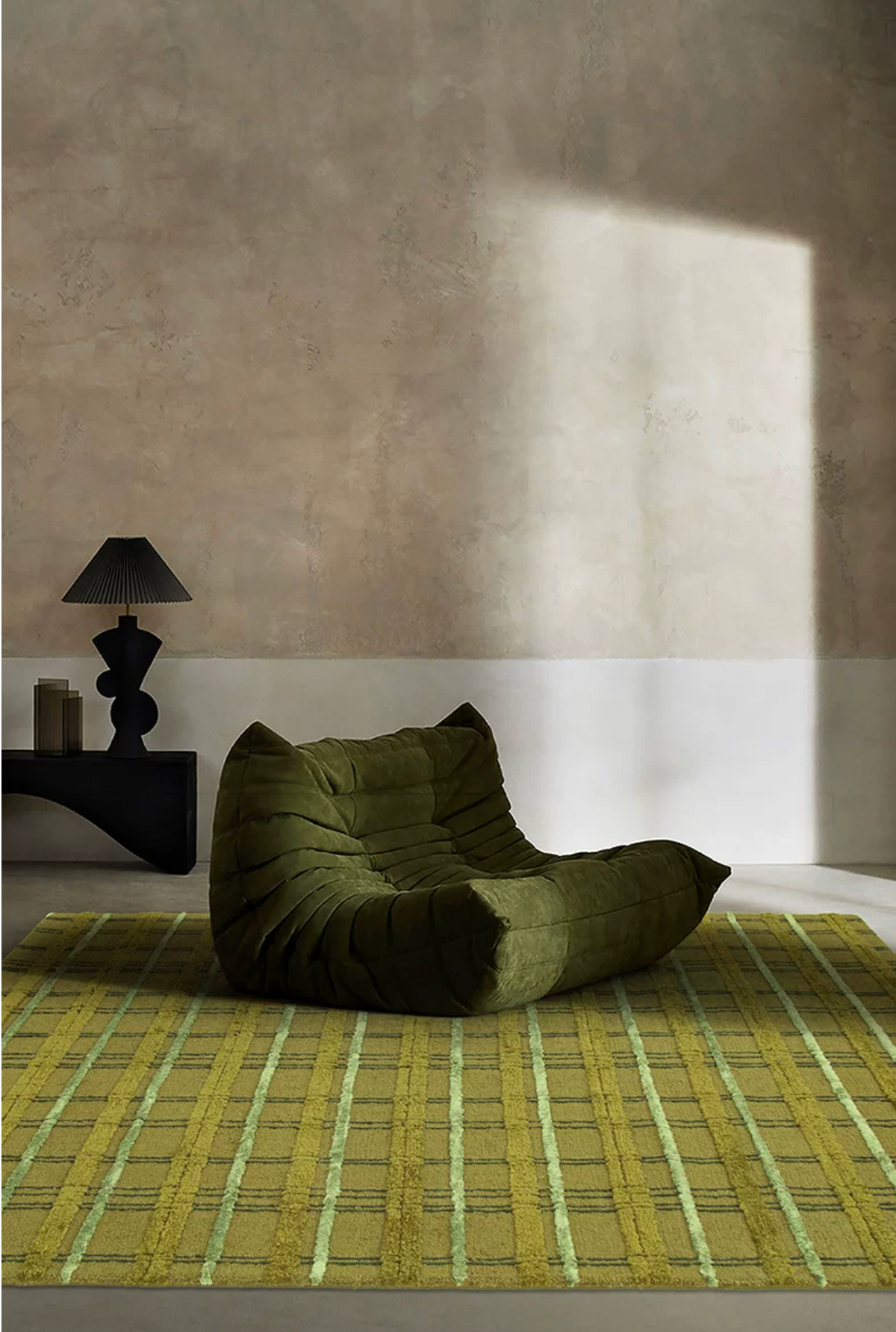 Hewn Earth Studio Moss Tartan Rug featuring a classic tartan pattern in rich green tones on woven fabric.