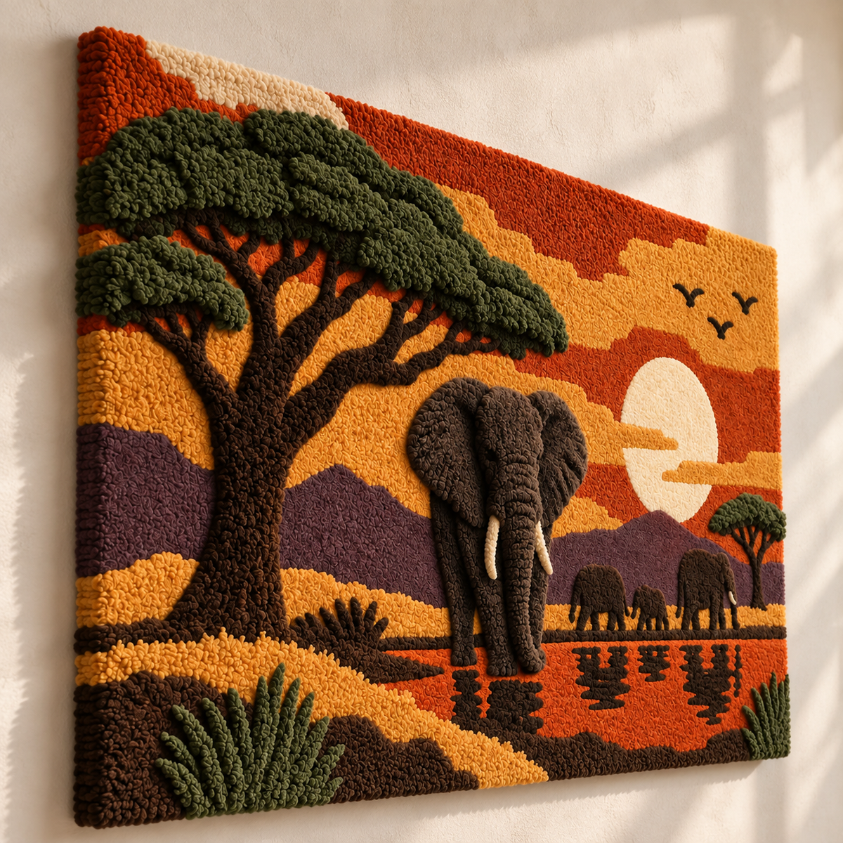 Hewn Earth Acacia Sunset Elephants wall art featuring silhouettes of elephants against a vibrant sunset sky.