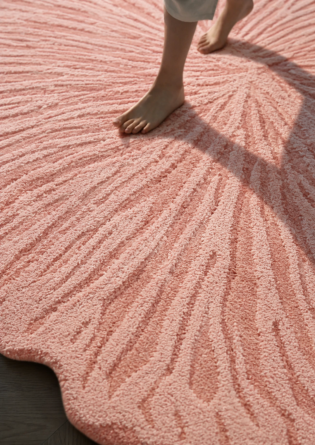 Hewn Earth Studio Solene rug featuring an elegant anemone foot pattern in soft, natural fibers with a textured, handcrafted appearance.