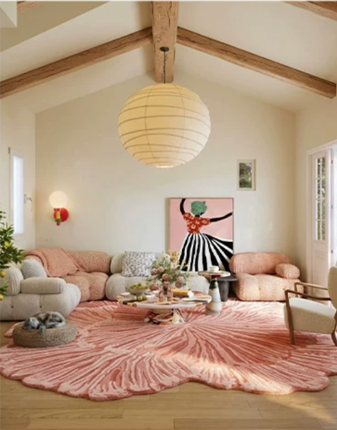 Hewn Earth Studio Solene rug with anemone floral pattern, soft neutral tones, and textured woven design for cozy living spaces.