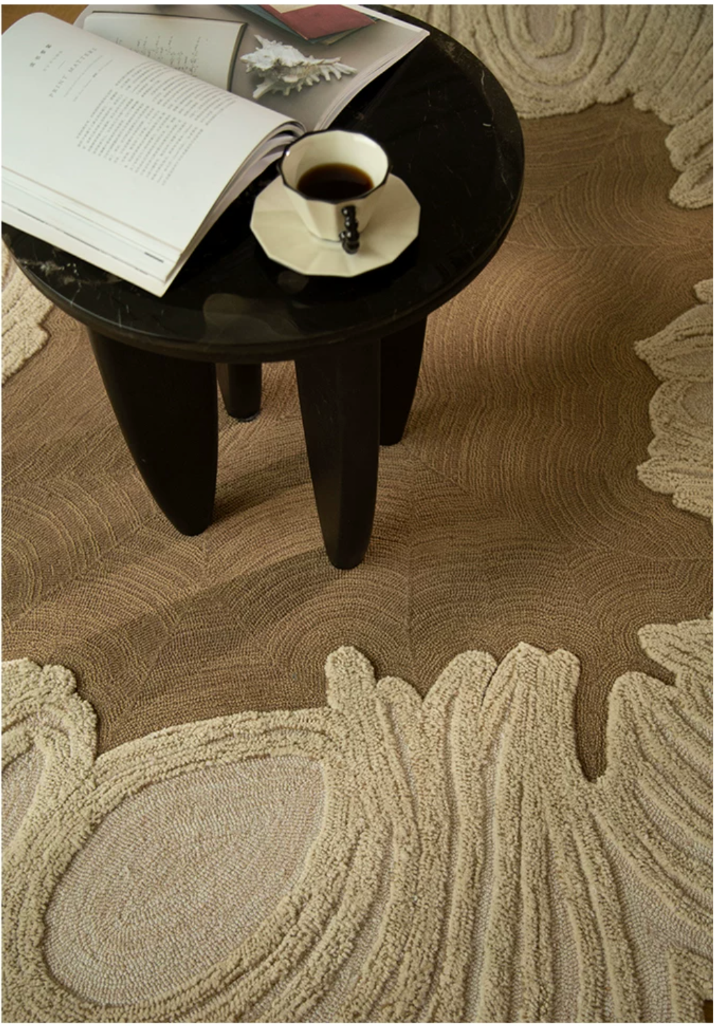 Close-up of a Hewn Earth Studio Camellia clay rug, showing detailed textured fibers and natural earthy tones.