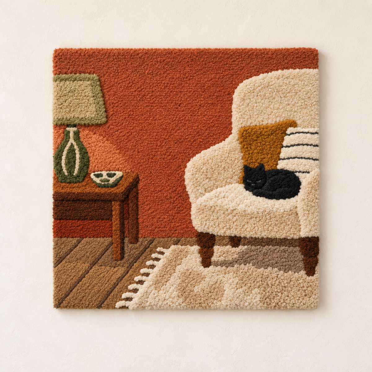 Hewn Earth Catnap in the Reading Chair wall art, depicting a cozy cat resting in a chair, printed on a light background.