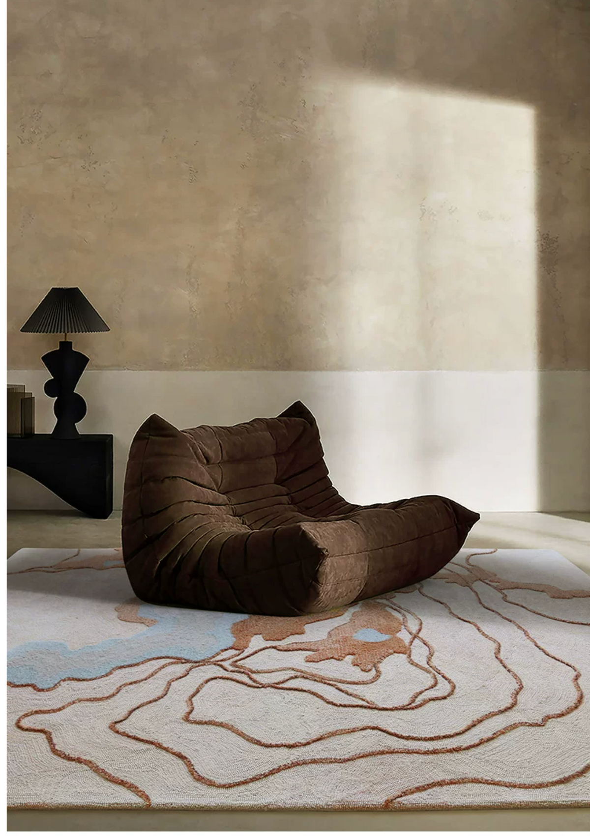 Close-up of Delta rug by Hewn Earth Studio showing intricate woven pattern and rich earthy tones.