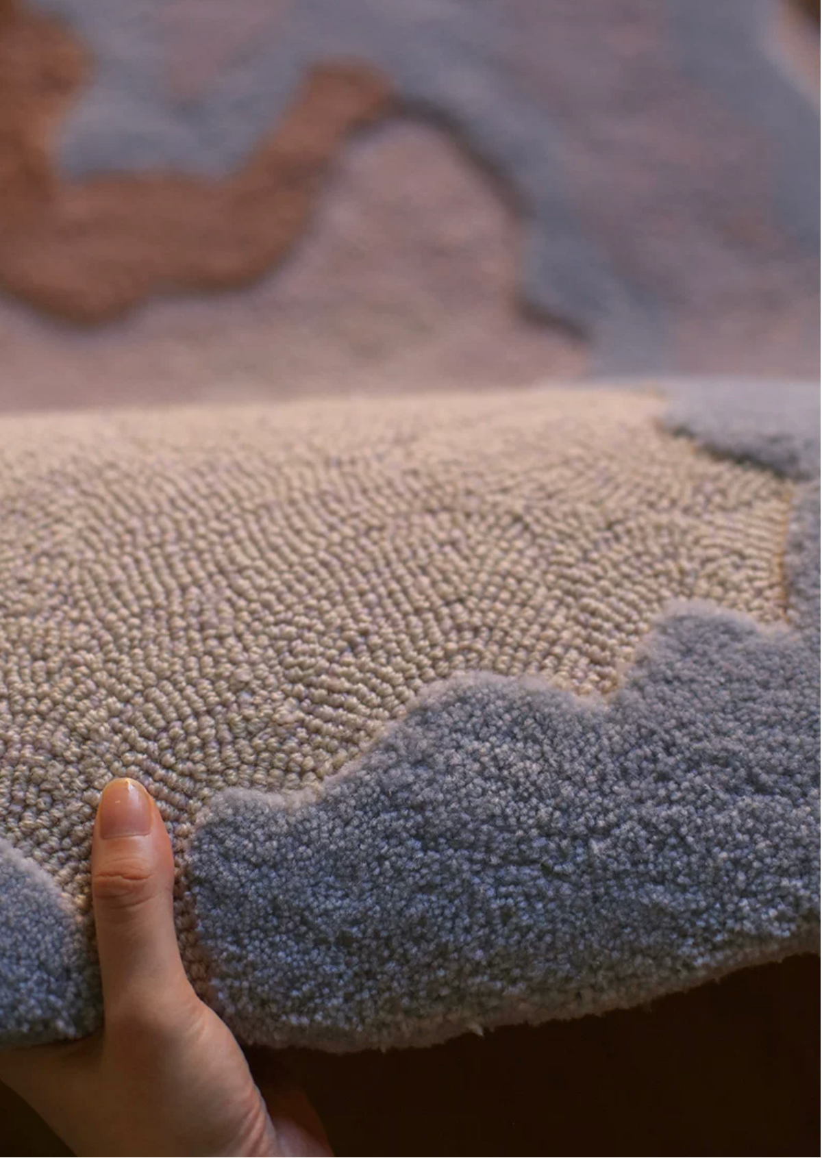 Delta rug by Hewn Earth Studio featuring a modern geometric pattern in earthy tones, perfect for contemporary home decor.
