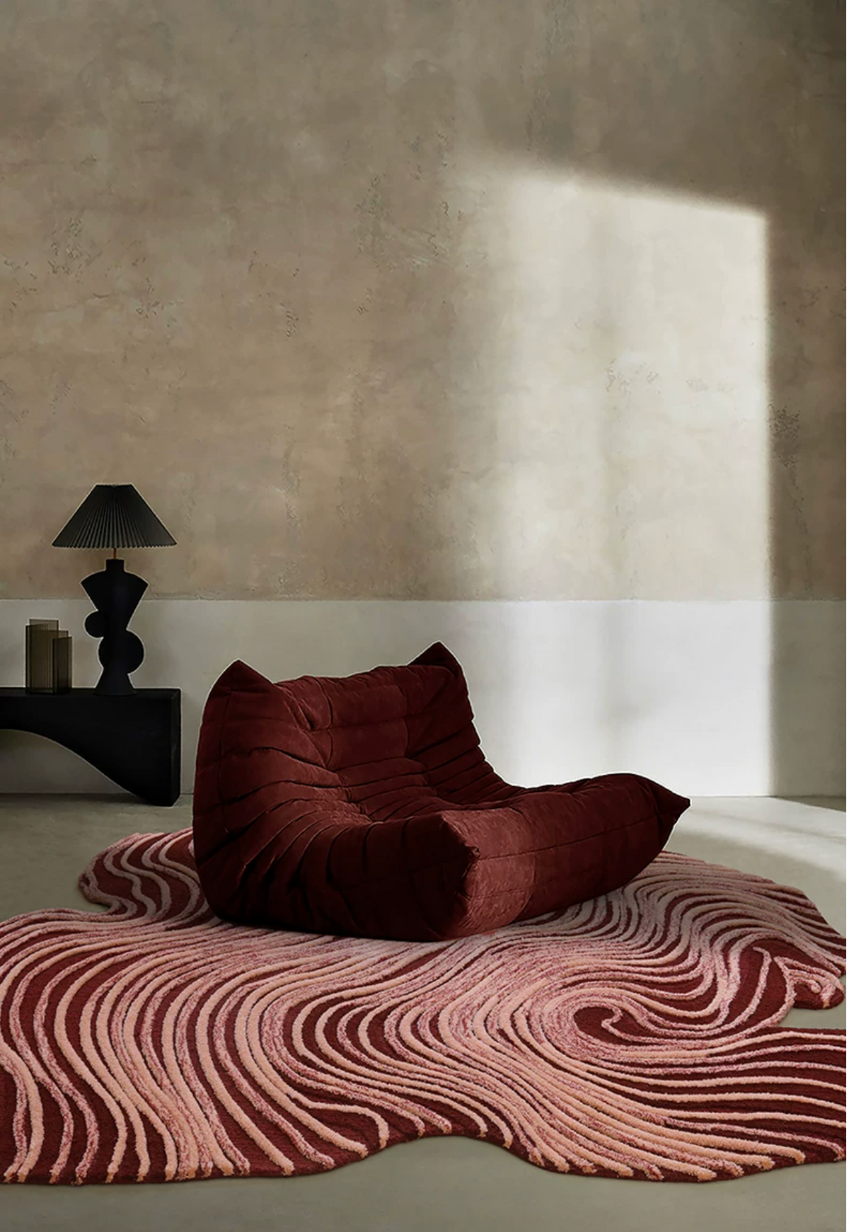Overhead view of a Dune rug by Hewn Earth Studio featuring earthy tones and textured woven design.