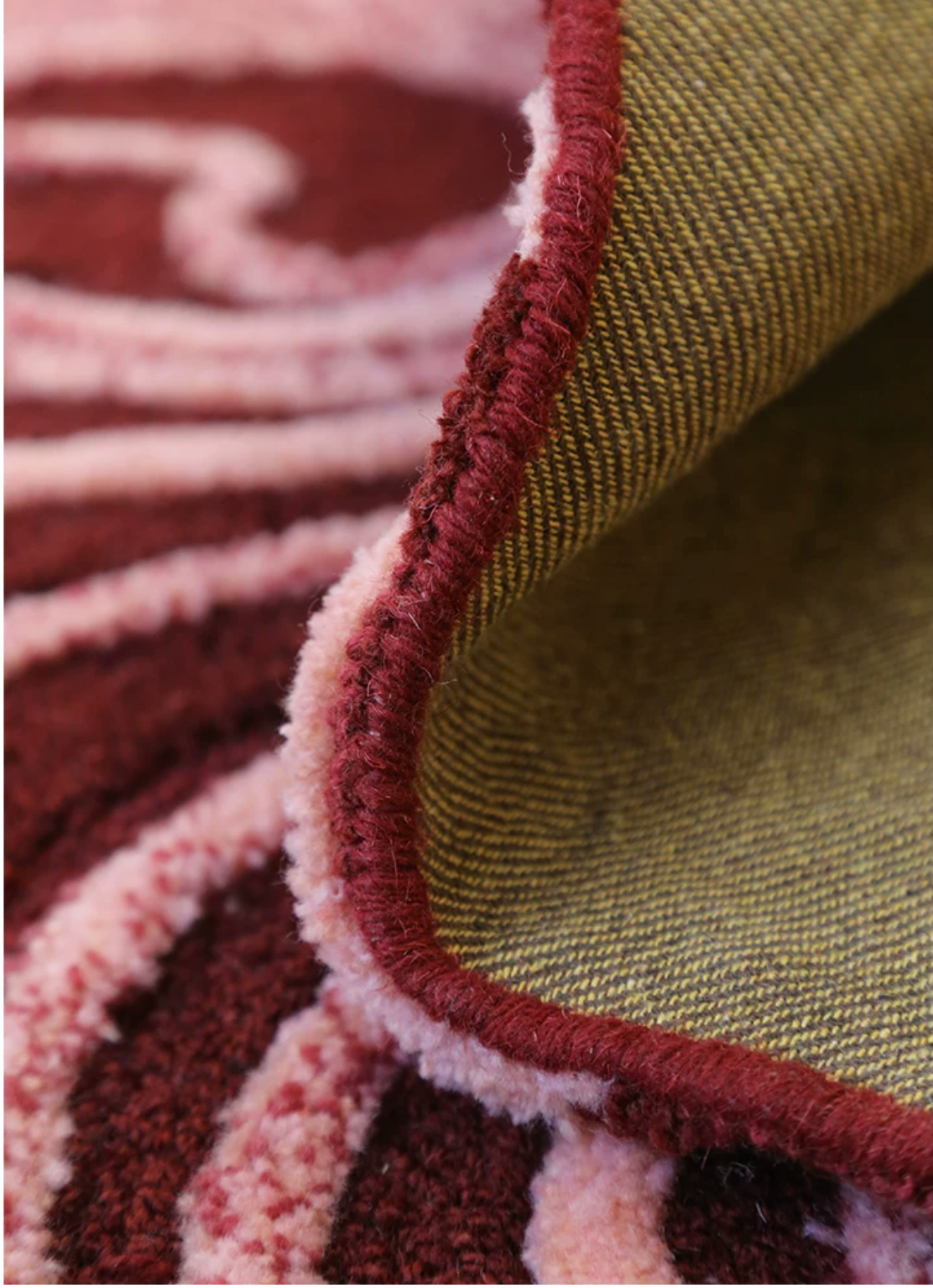 Hewn Earth Studio Dune rug with textured neutral-toned pattern displayed on a modern living room floor