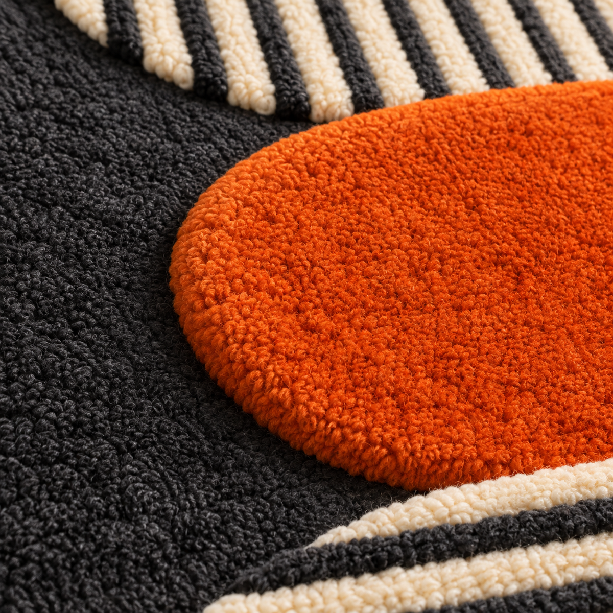 Hewn Earth Ember Oval Wall Art featuring striped moon design, detailed close-up showing textured, artistic ceramic surface.