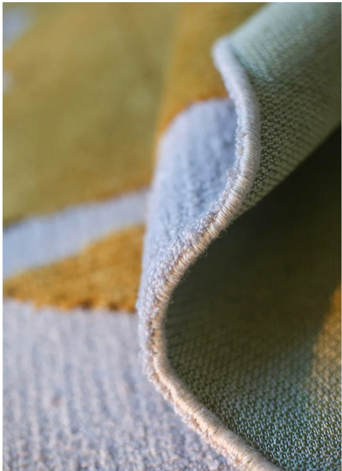 Hewn Earth Studio foil rug with metallic foil design, textured surface, and modern aesthetic for stylish home décor.
