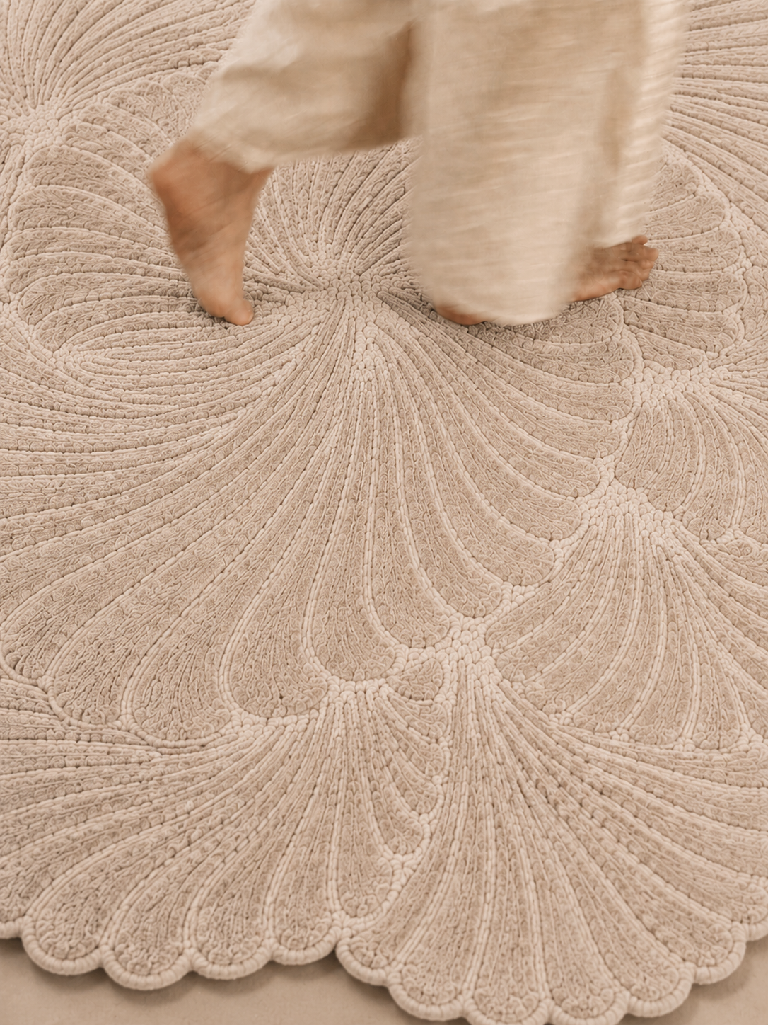 Hewn Earth Studio Frond rug with a natural oat-colored woven design, featuring soft, textured fibers for a cozy, organic look.