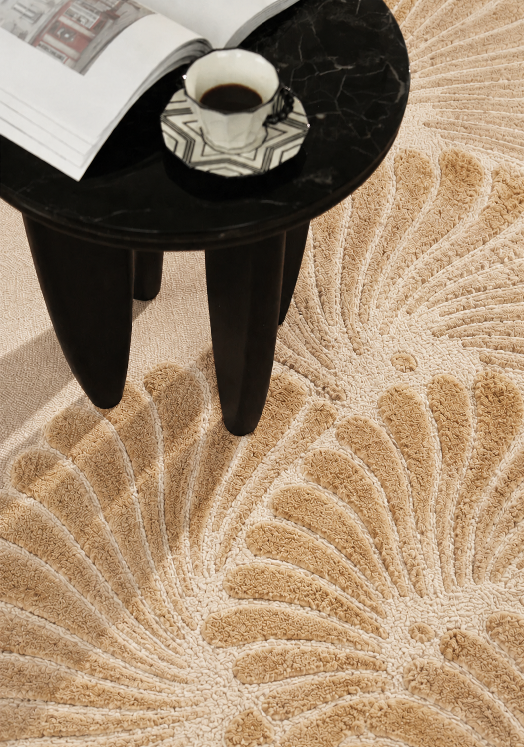 Hewn Earth Studio Frond rug with sand-colored, textured pattern, ideal for cozy living room or bedroom decor.
