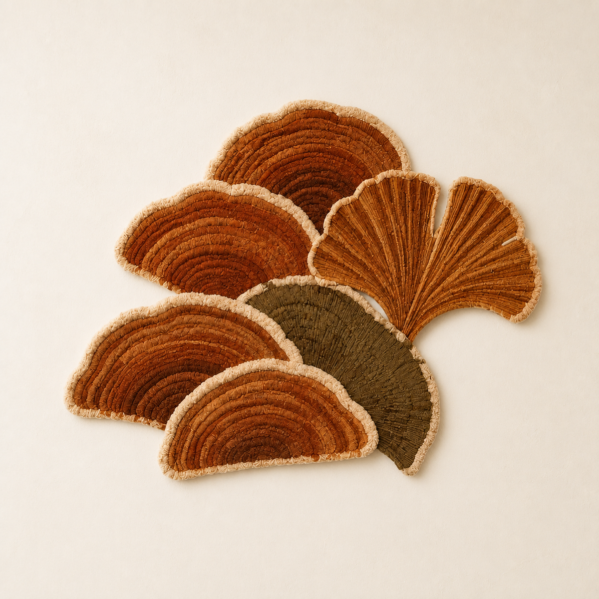 Rust-colored fan leaves wall art by Hewn Earth, featuring textured leaf designs on a neutral background.