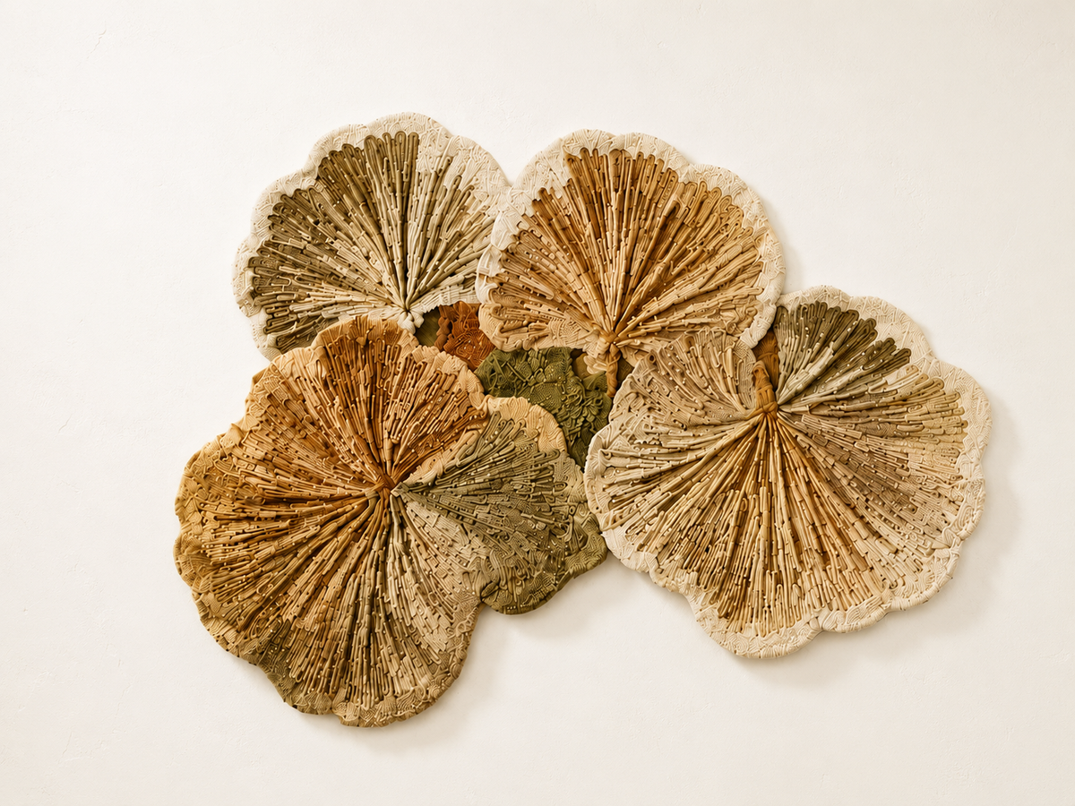 Hewn Earth Autumn Ginkgo Cluster wall art featuring vibrant ginkgo leaves in warm autumn colors on a textured background.
