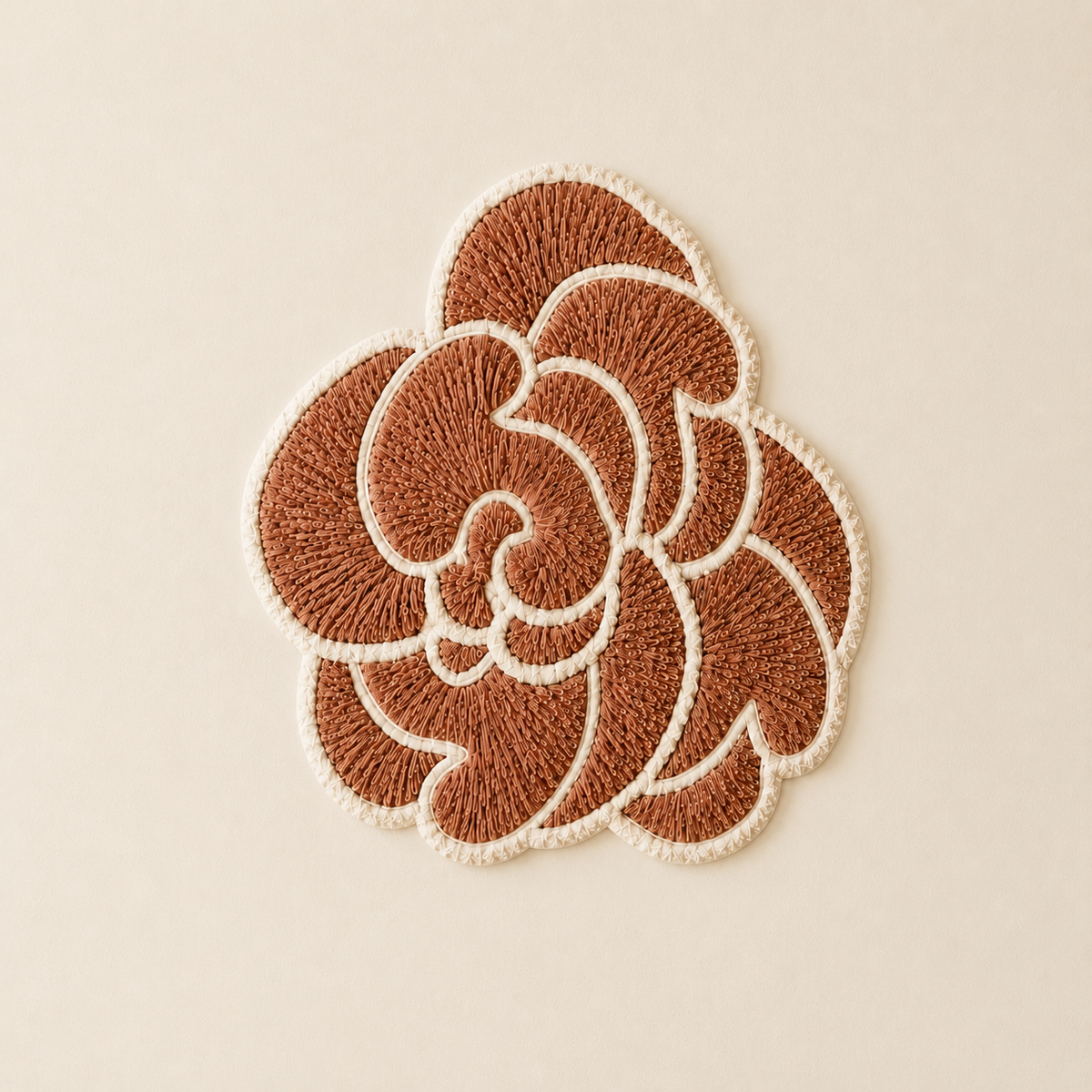 Hewn Earth Spiral Rose wall art featuring a detailed, textured rose design in earthy tones for home decor.