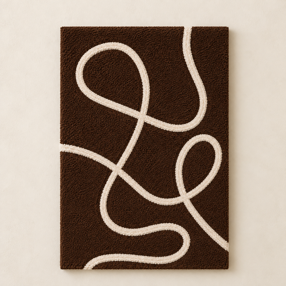 Hewn Earth Cocoa Loops wall art featuring abstract cocoa bean shapes in warm earthy tones on a textured background.