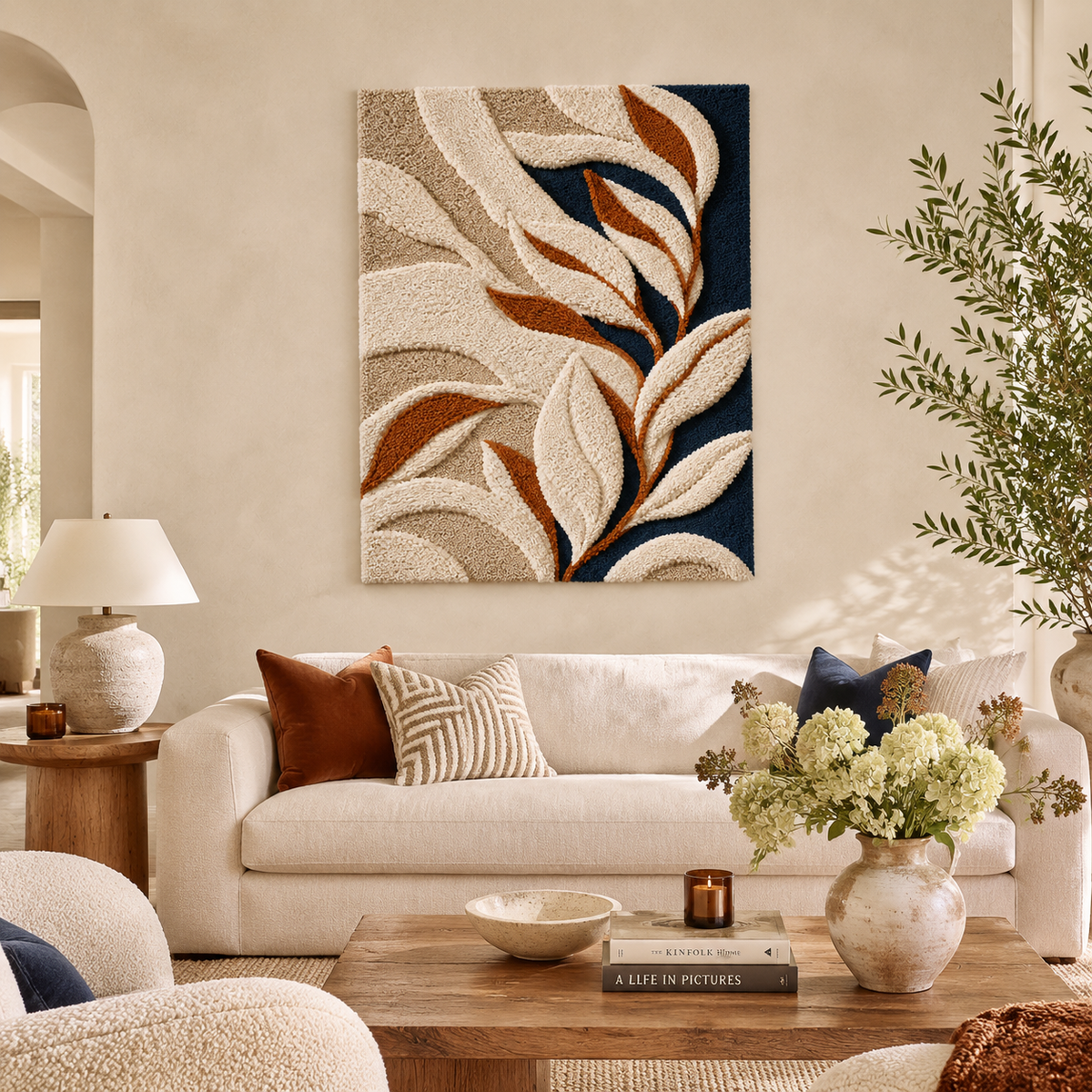 Ivory leaf wall art on navy background by Hewn Earth, modern decorative piece for living room or bedroom decor.