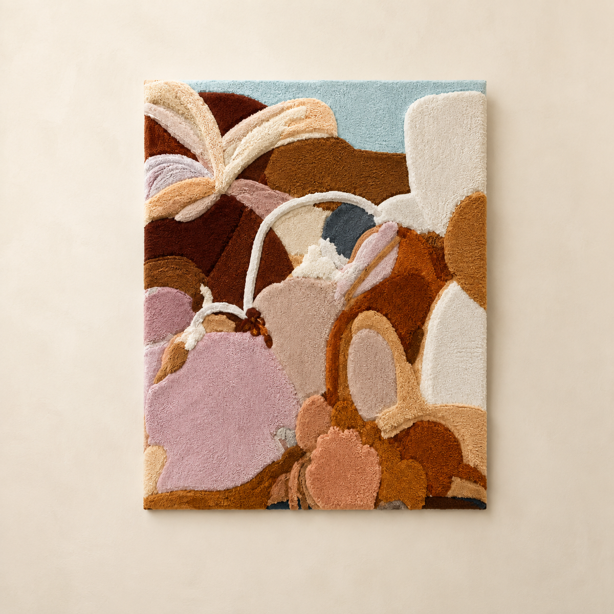 Colorful pastel pebble-shaped wall art by Hewn Earth, featuring smooth, rounded textured pebbles in soft pastel shades.