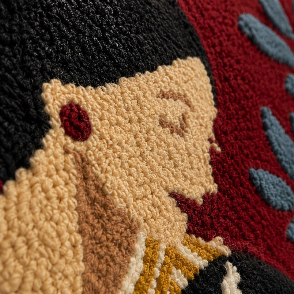 Close-up of Hewn Earth Crimson Cat Tender wall art, featuring detailed crimson cat design on textured surface.