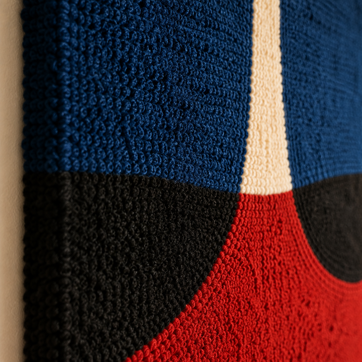 Close-up of Hewn Earth Indigo Vessel Split wall art showcasing textured ceramic design and vibrant blue hues.