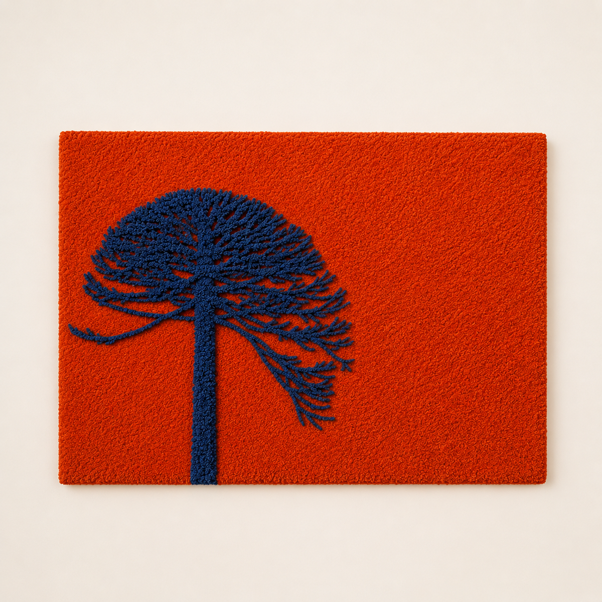 Cobalt Wind Tree wall art by Hewn Earth, featuring a detailed blue and silver abstract tree design on a wall.