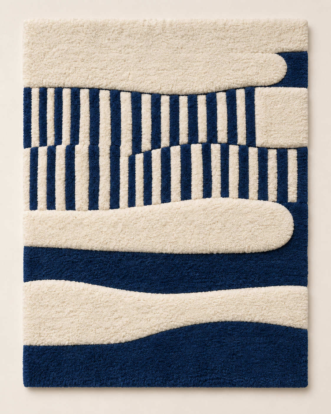 Hewn Earth wall art featuring indigo waves and ivory reeds, with abstract ocean-inspired design and textured details.