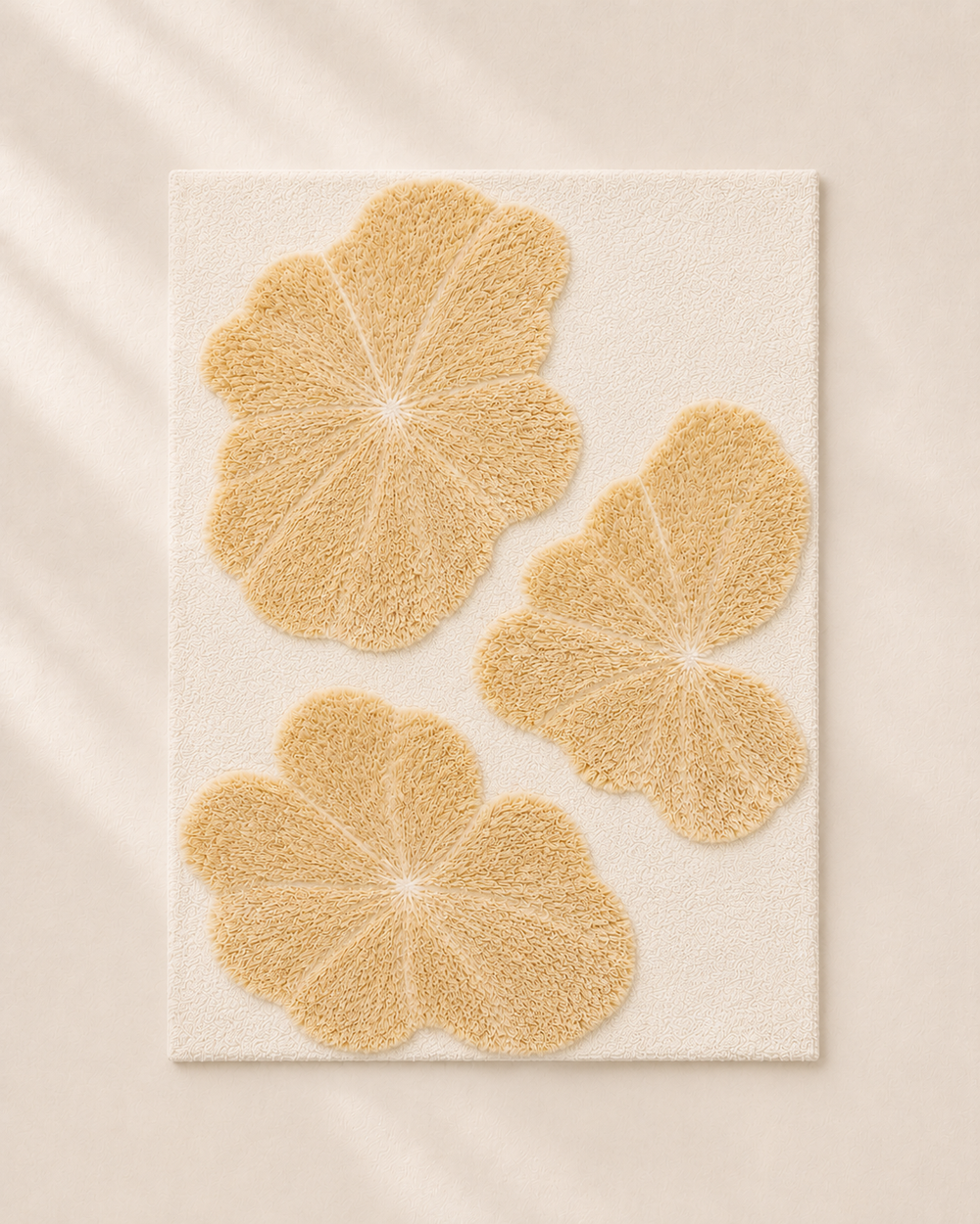 Hewn Earth Studio Lily rug featuring a soft, woven textile with floral pattern in neutral tones, ideal for cozy living spaces.