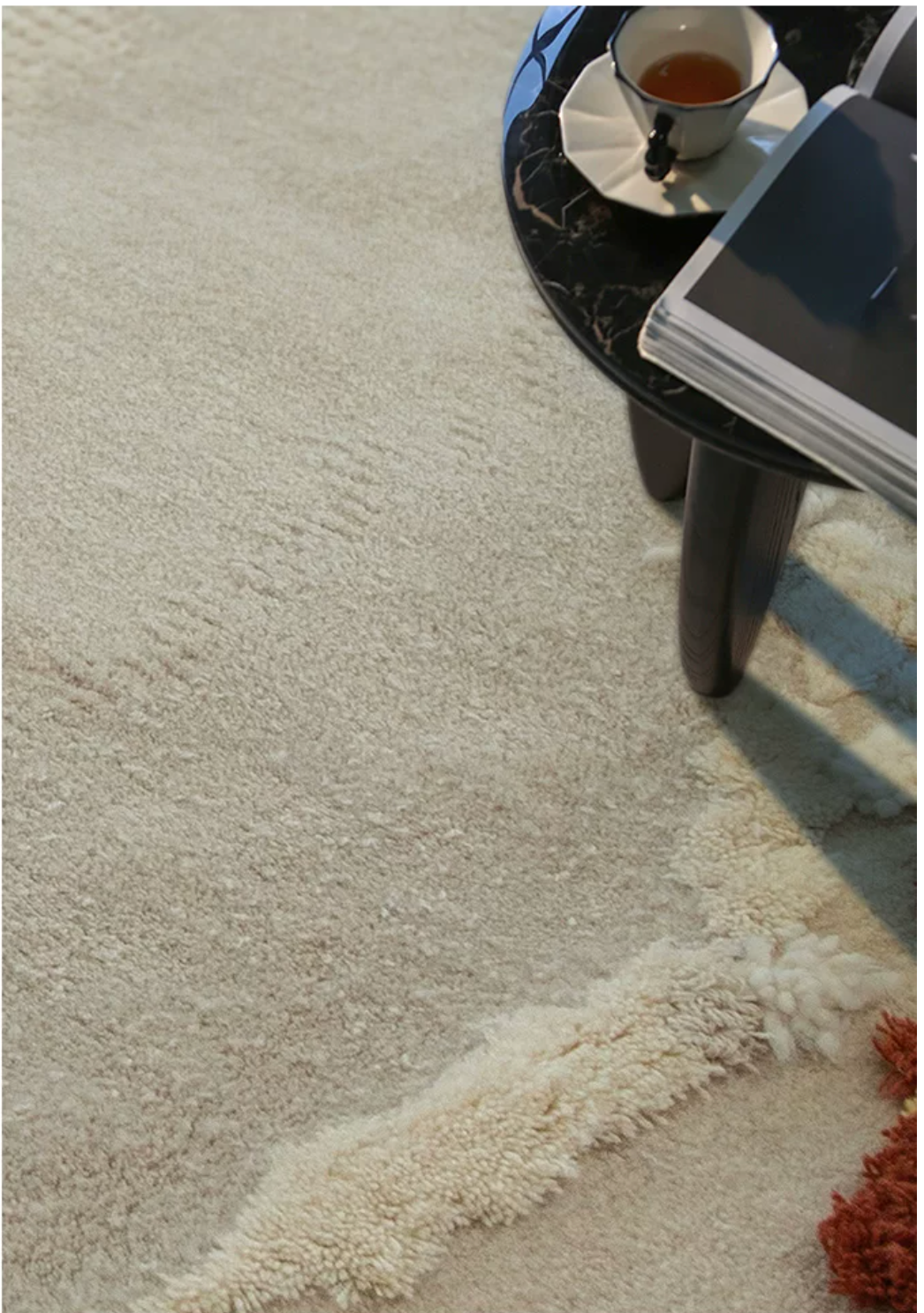 Hewn Earth Studio Meadow rug with autumn-colored design, featuring natural woven textures and a soft, earthy aesthetic.