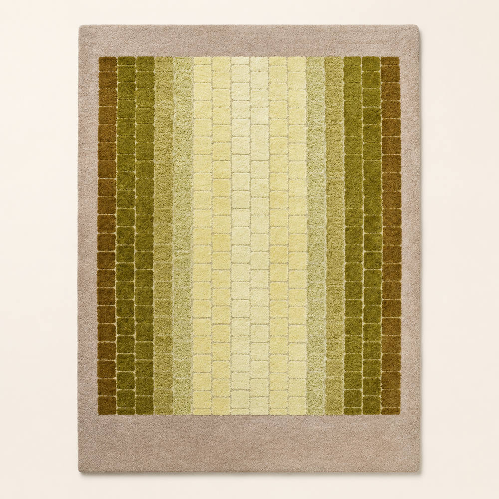 Hewn Earth Studio mosaic rug with intricate geometric patterns in earthy tones, showcasing detailed craftsmanship.