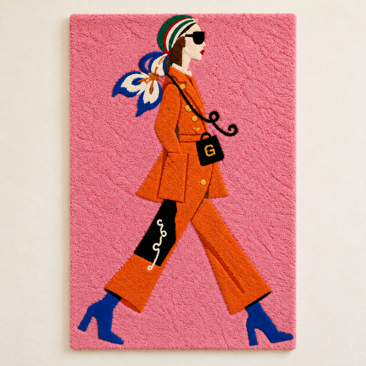 Hewn Earth Orange Suit City Stride wall art featuring an abstract orange and cityscape design on a light background.