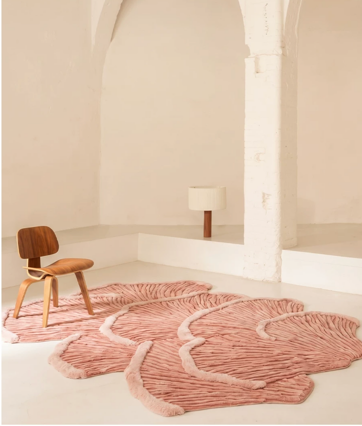 Hewn Earth Studio Palma rug featuring intricate woven design in neutral tones, ideal for enhancing living room decor.