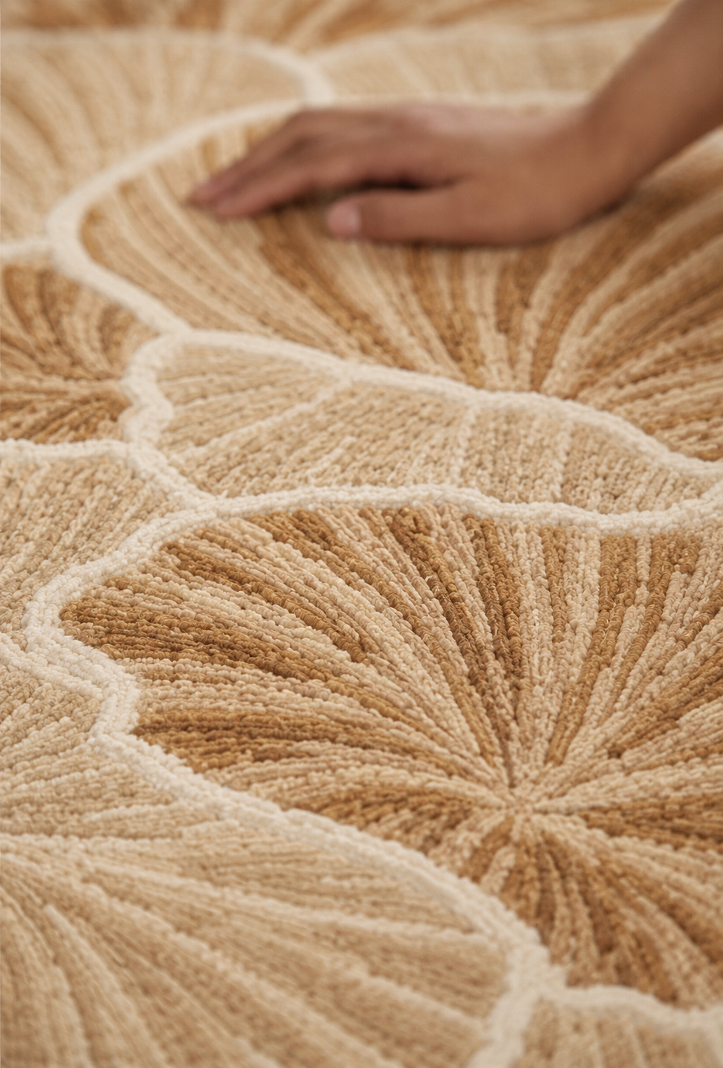 Hewn Earth Studio Petal rug with folded petal design, soft textures, and vibrant colors on a neutral background.