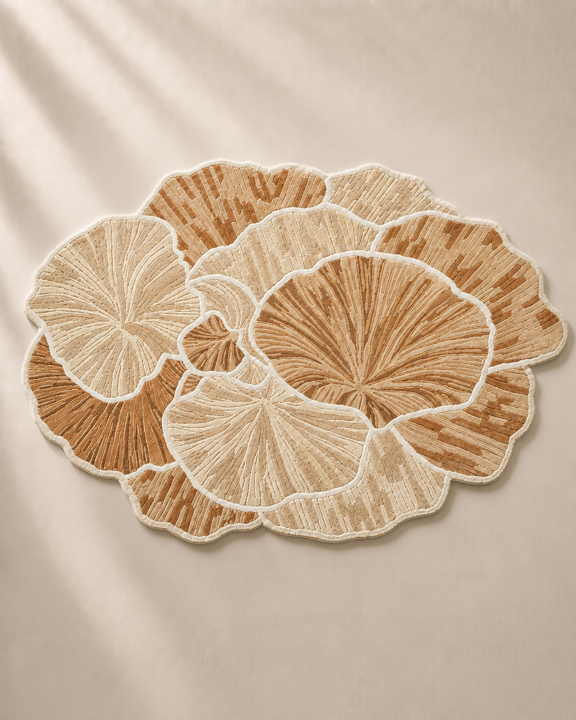 Hewn Earth Studio Petal rug with soft, floral-inspired design featuring pastel colors and textured weave for cozy home decor.
