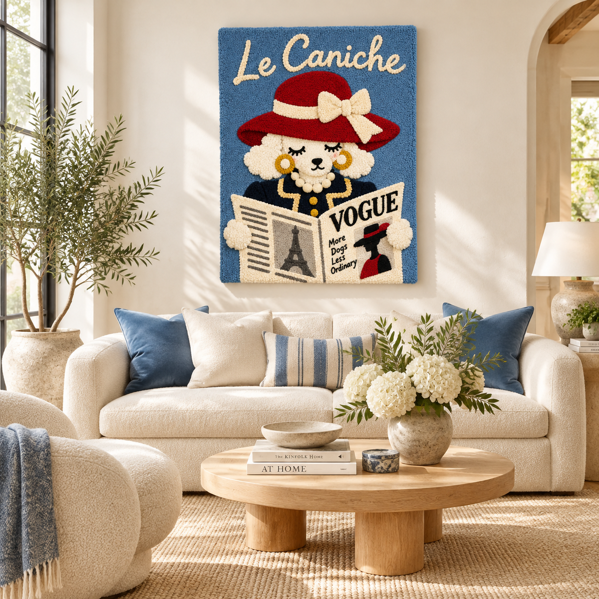 Wall art featuring a poodle reading the fashion pages, displayed in a stylish room setting by Hewn Earth.