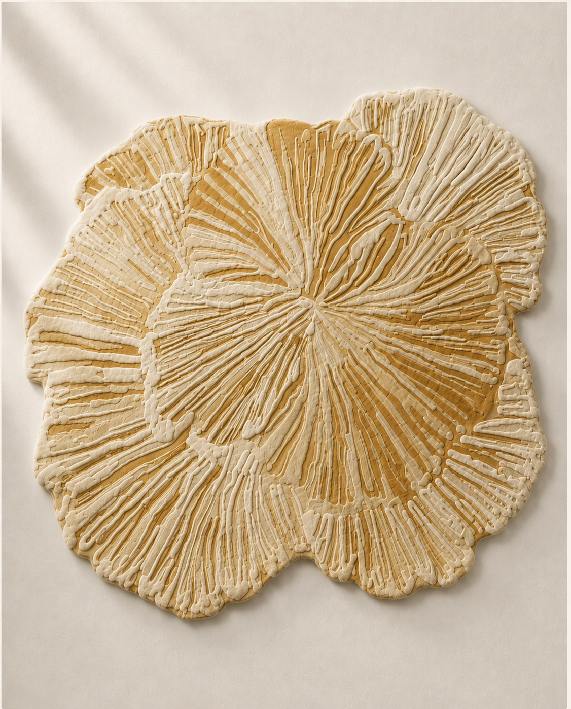 Hewn Earth Studio Solene rug with intricate geometric patterns in neutral tones, plush texture, and handcrafted design.