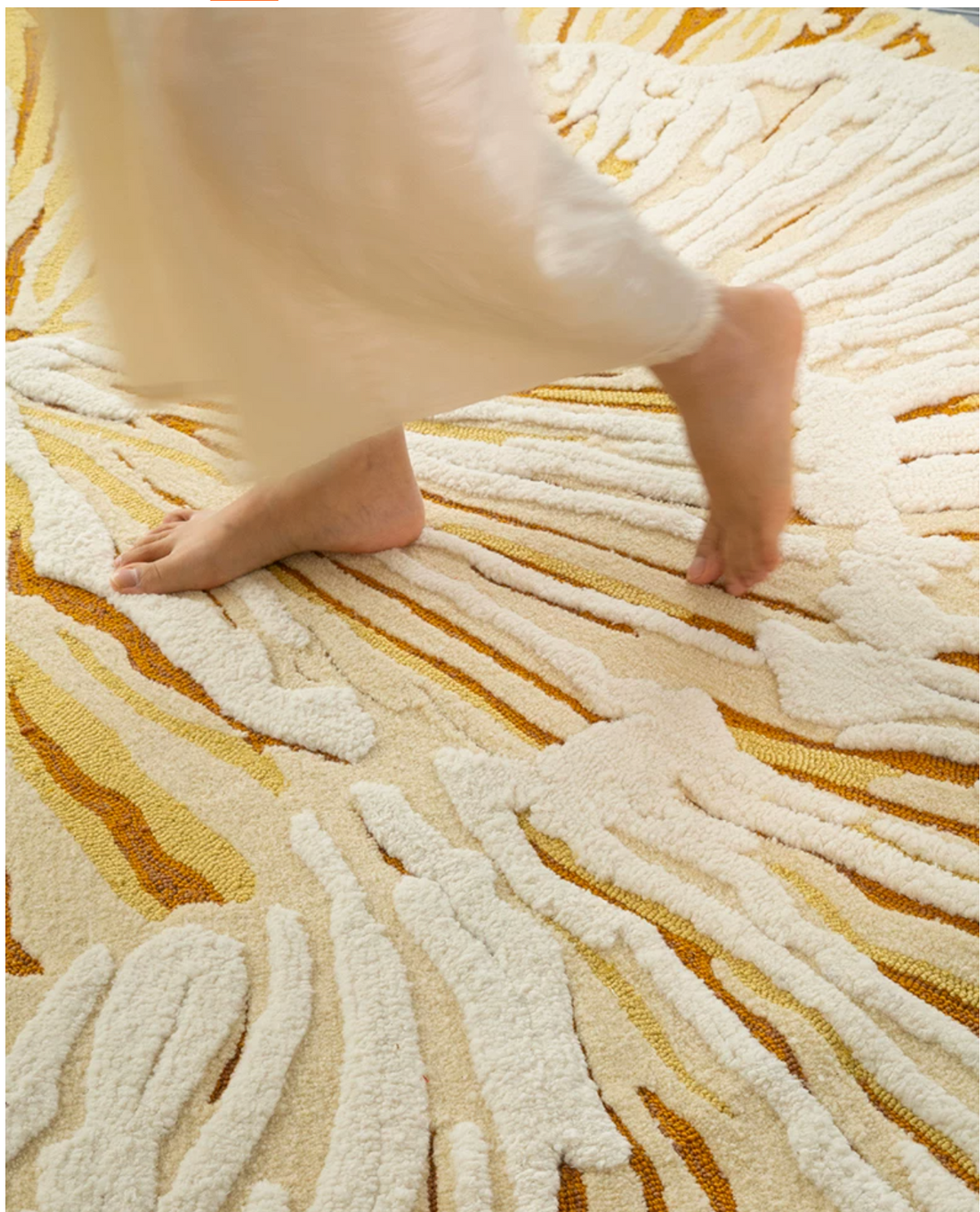 Hewn Earth Studio Solene rug with textured pile in neutral tones, showcasing soft, woven fabric and intricate pattern.