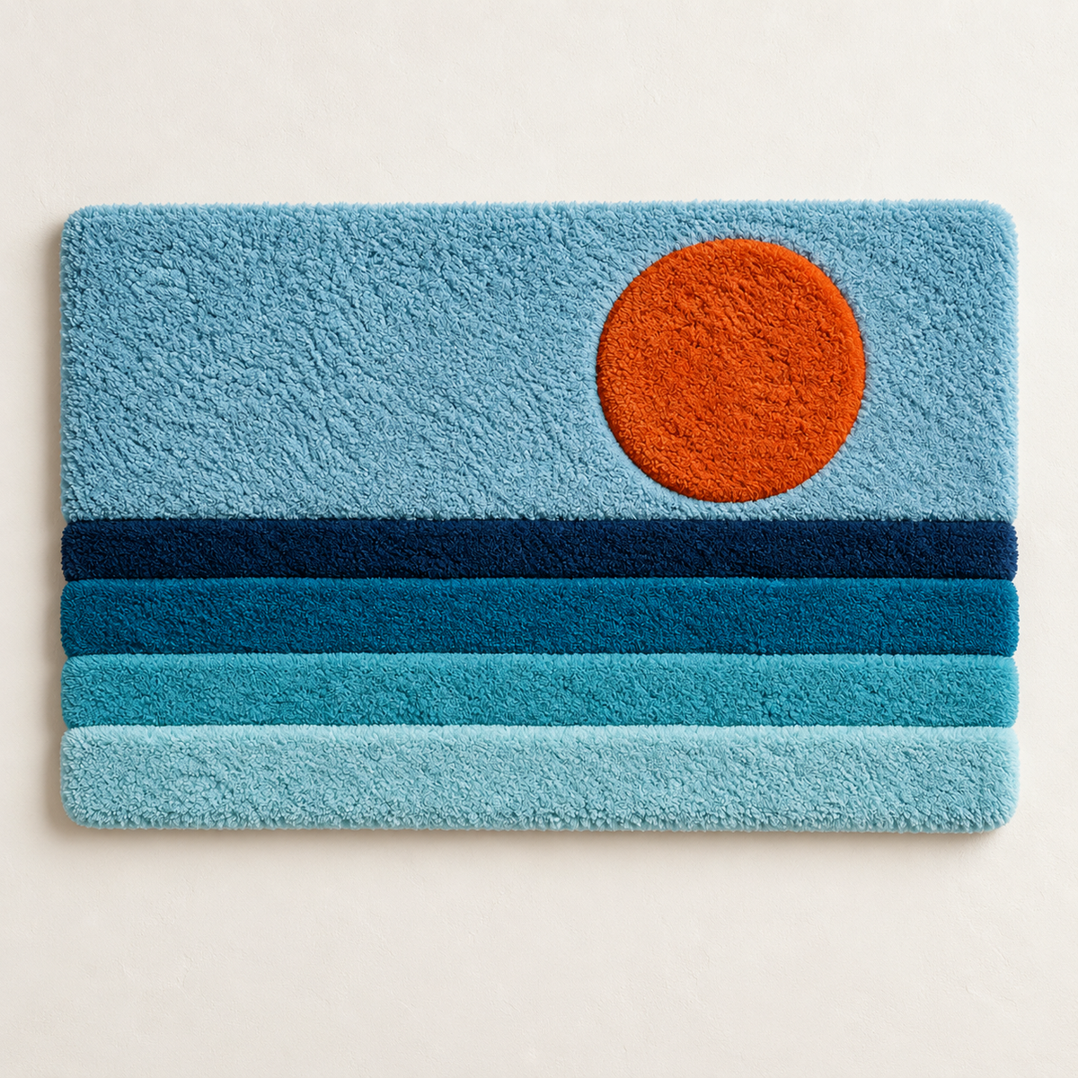 Hewn Earth wall art featuring a vibrant tangerine sun over calming blue tides, ideal for modern coastal home decor.