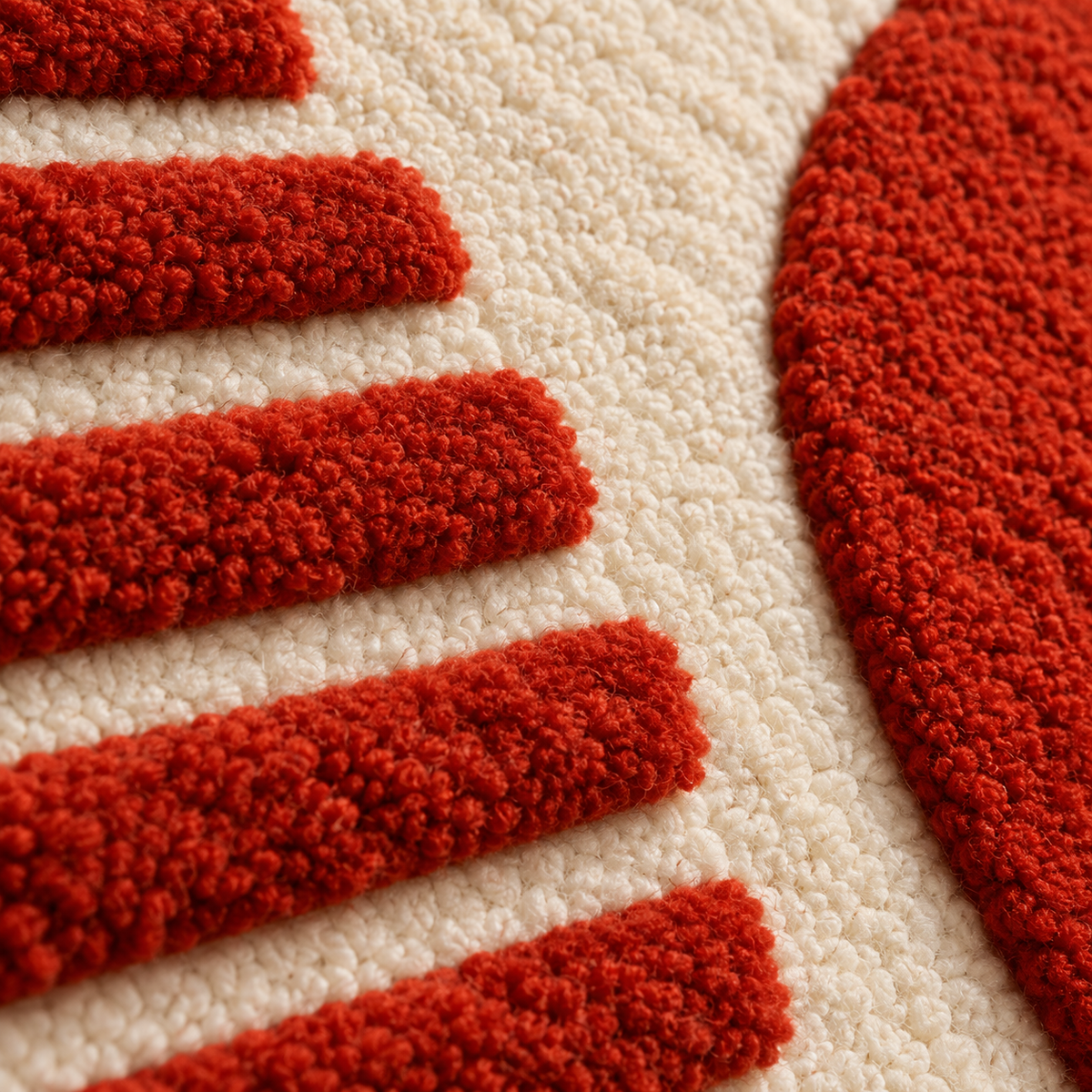 Close-up of Hewn Earth terracotta half-moon wall art, showcasing textured surface and warm earthy tones.