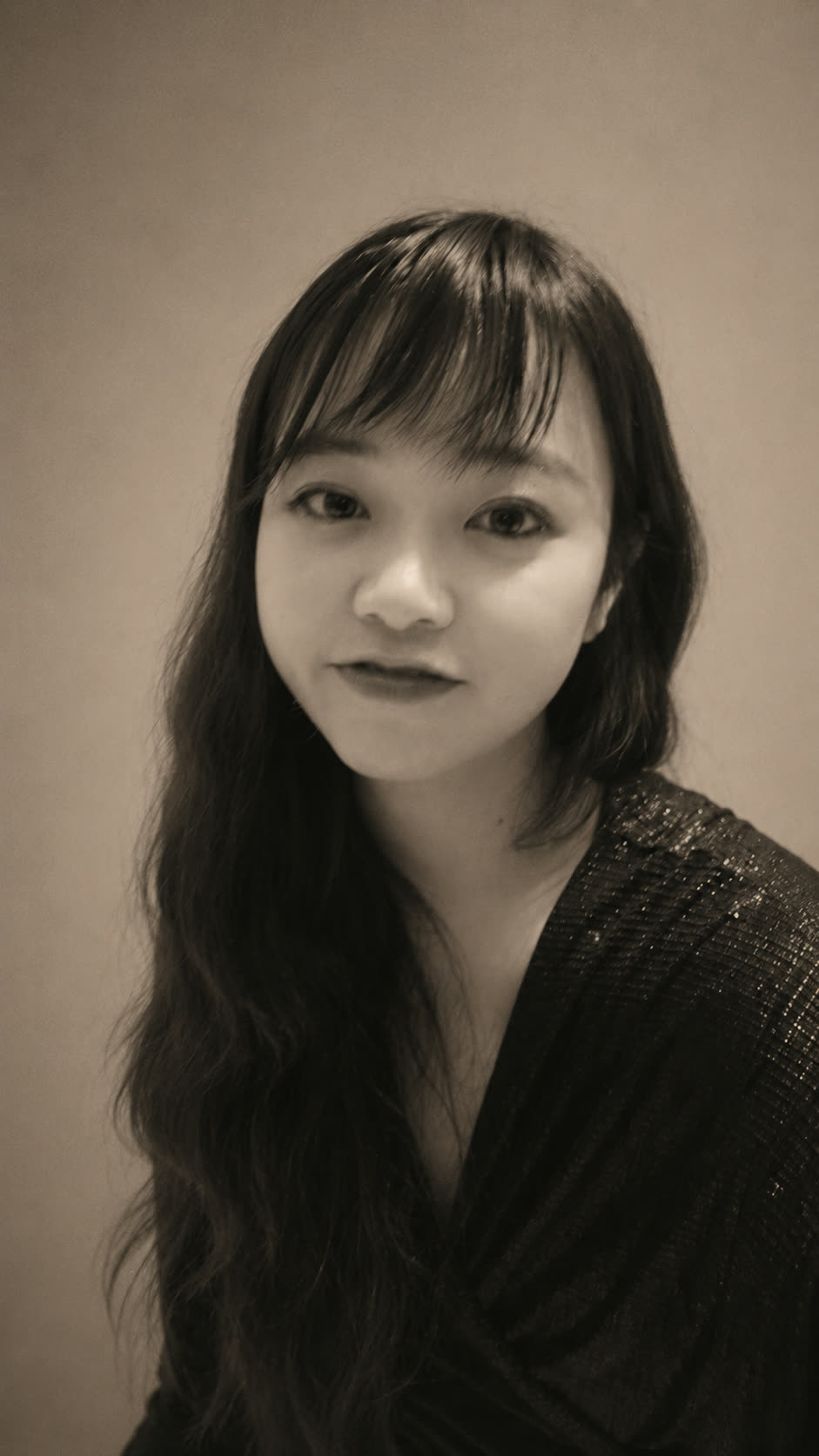 Vanessa — portrait (vertical crop, same warm grade)
