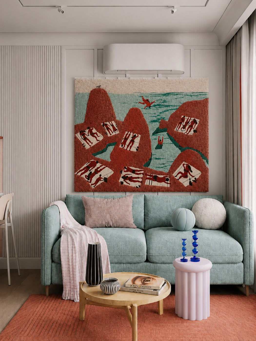 A hand-tufted wool bathers scene in terracotta and sea green hung from a rod above a mint bouclé sofa