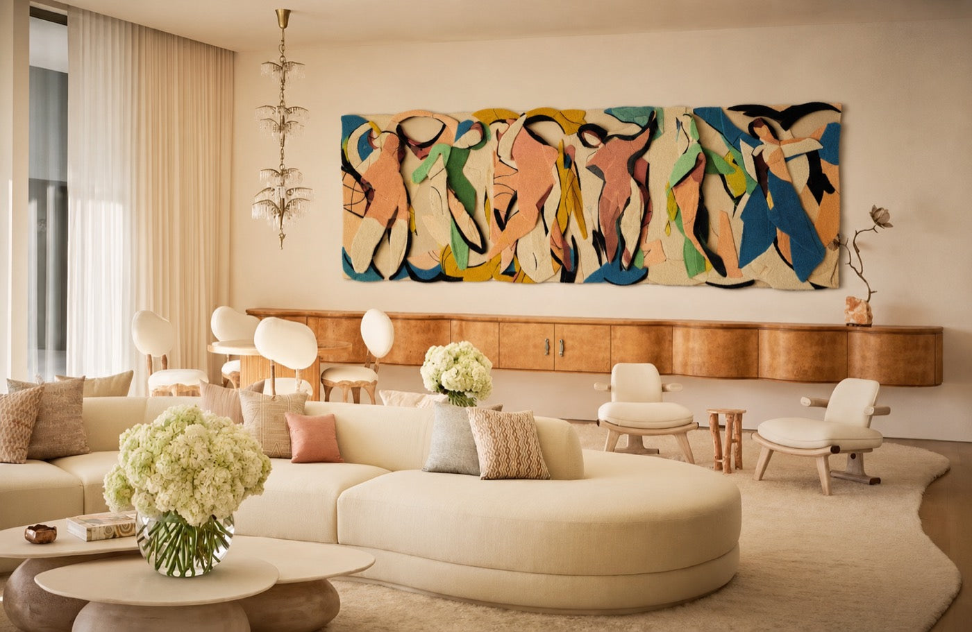 A wide hand-tufted wool panel of dancing figures in coral, teal and ochre hung above a burlwood credenza
